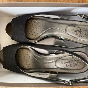 dressy black heels never worn still in box